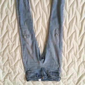 Light blue high quality distressed jeans.